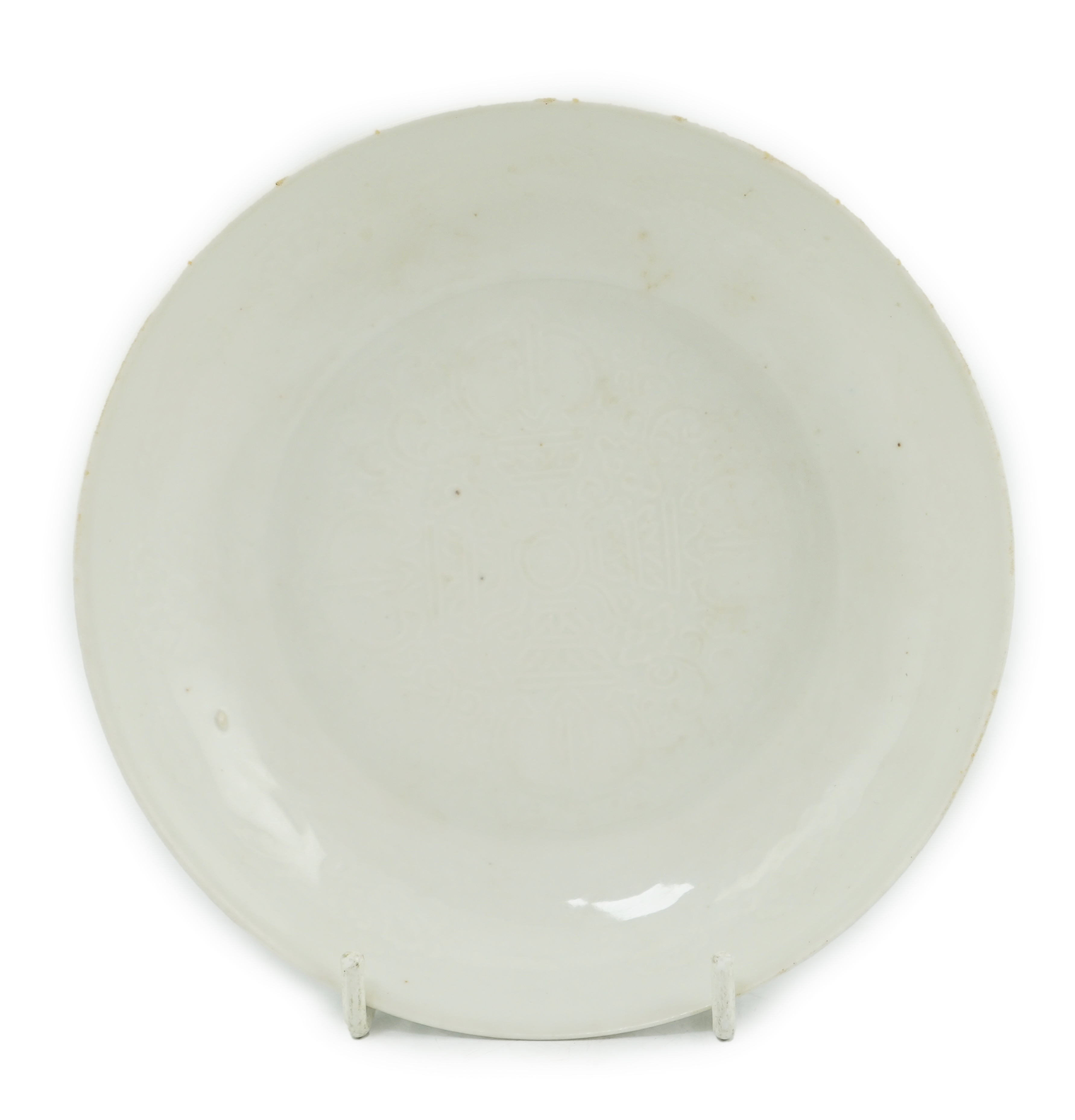 A Chinese moulded white glazed saucer dish, Yongle mark, Republic period